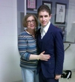 With son, lead in Cabaret